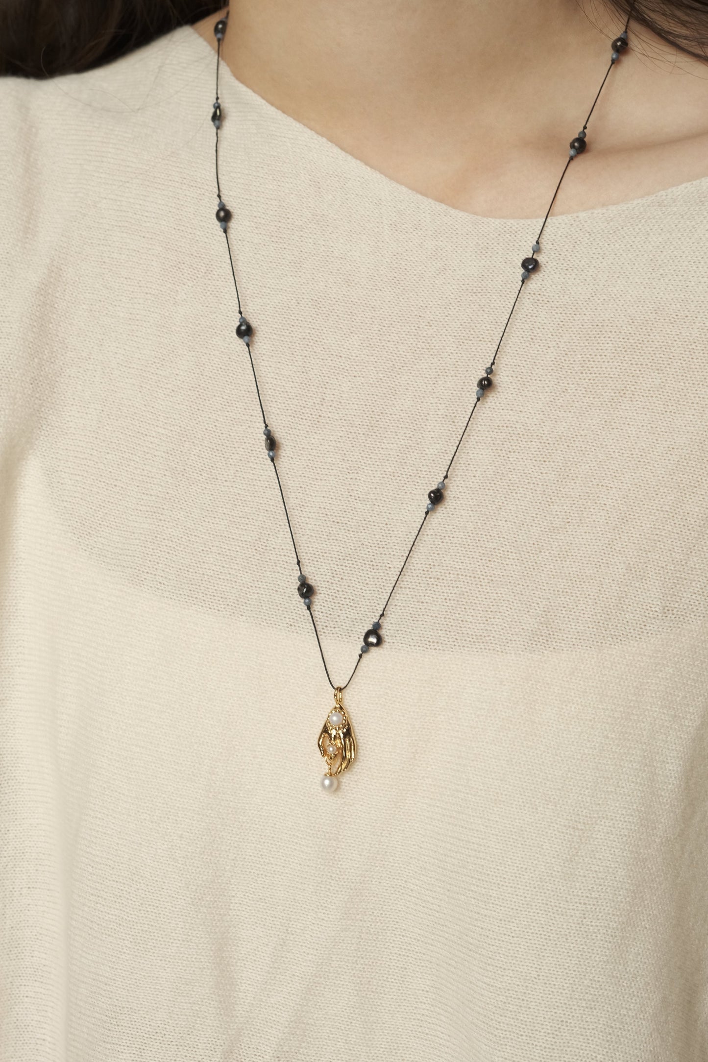 HAND & PEARL BRAIDED NECKLACE