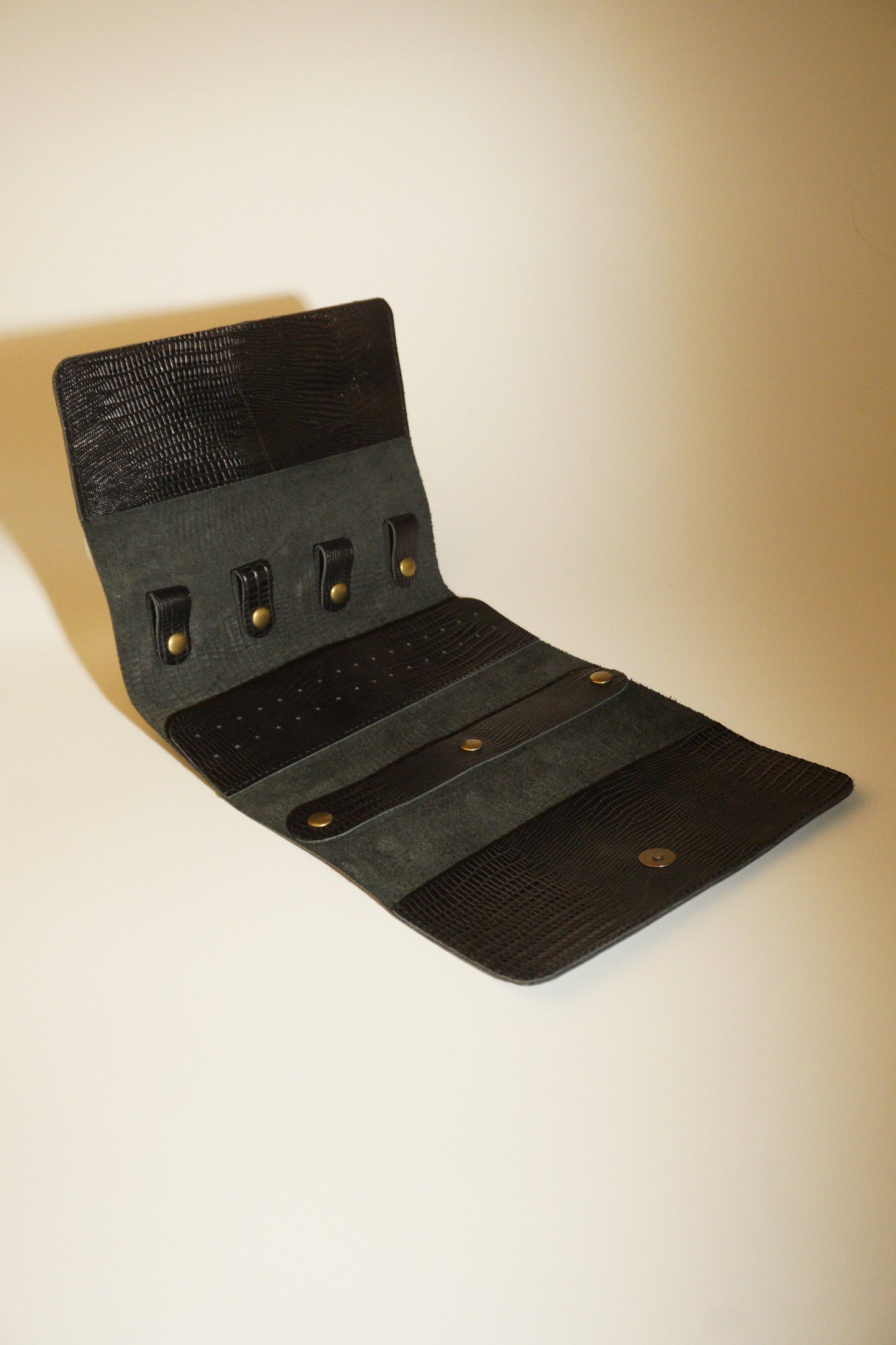 FOLDABLE COWHIDE JEWELRY POUCH