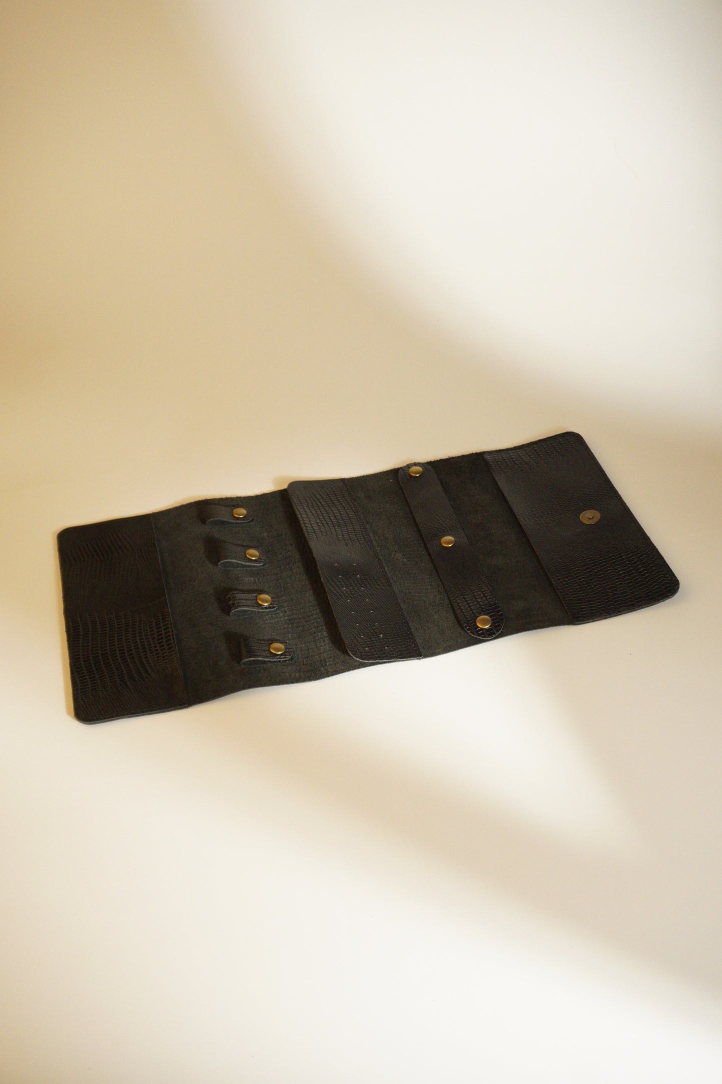 FOLDABLE COWHIDE JEWELRY POUCH